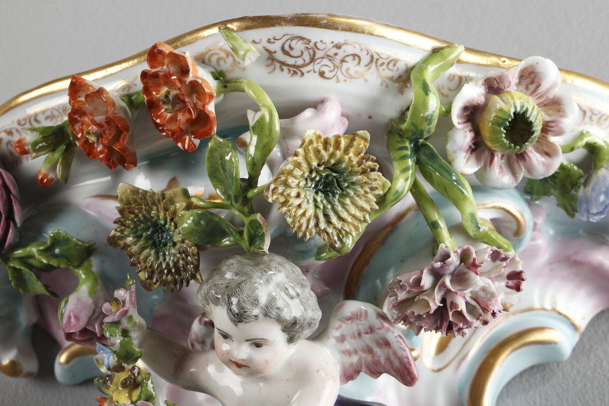 PAIR OF SMALL ROCAILLE CONSOLES IN THE STYLE OF THE MEISSEN MANUFACTORY